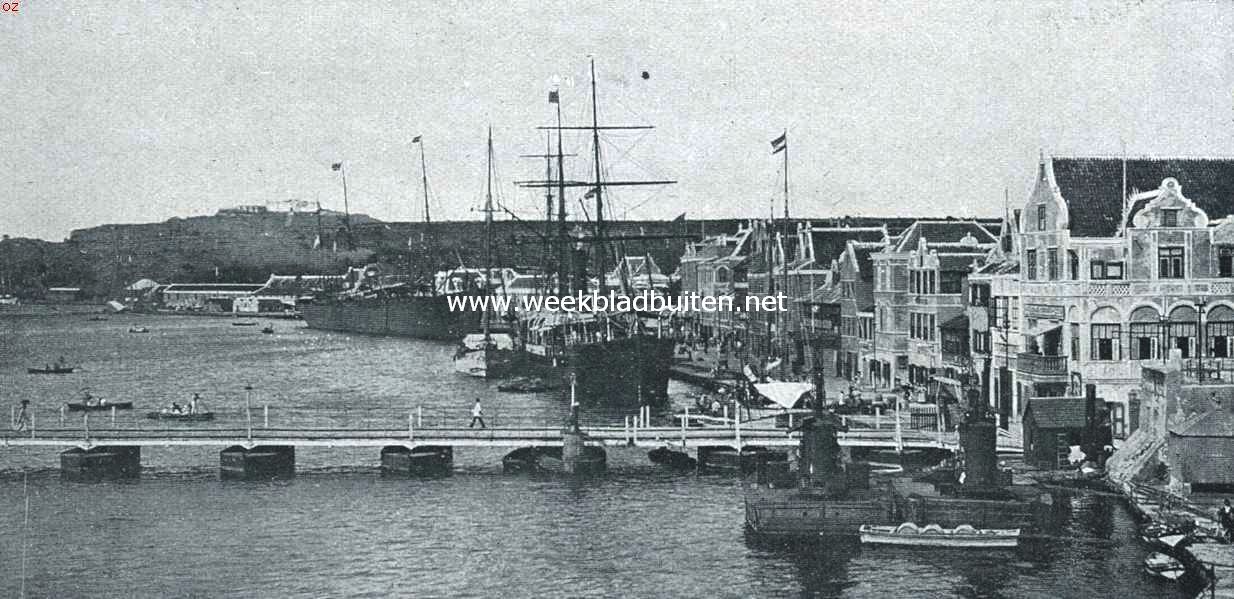 Dagelijksche dingen van Curaao. Gezicht op de wijk Punda. Op den achtergrond het 60 M. hoog gelegen Fort Nassau