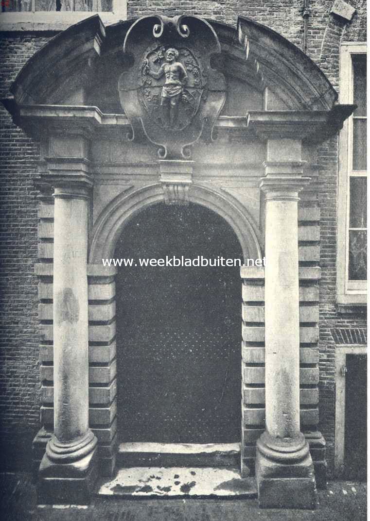 Wijnkoopersgildehuis te Amsterdam. Het poortje van het Wijnkoopersgildehuis te Amsterdam